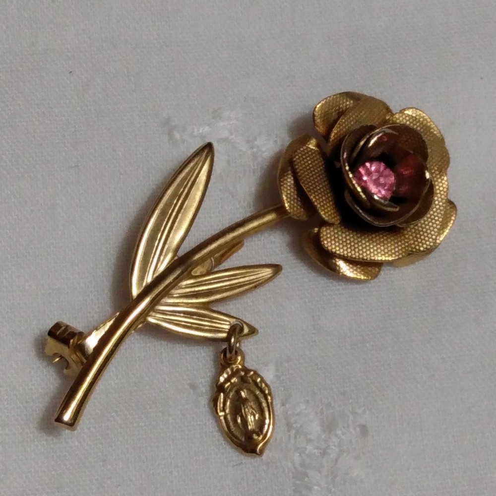Gold Tone Rose Pin with Miraculous Charm
